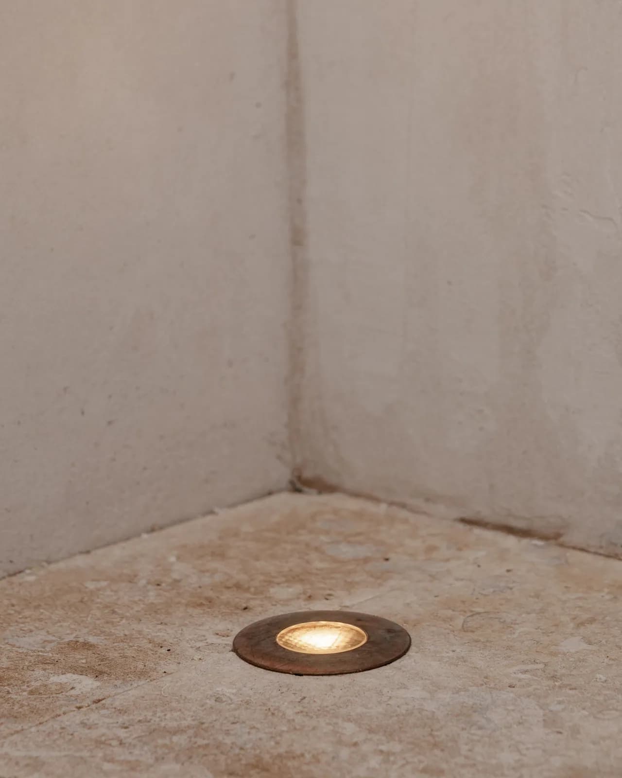 Recessed uplight set into a stone ledge at the Forrest Jr. estate